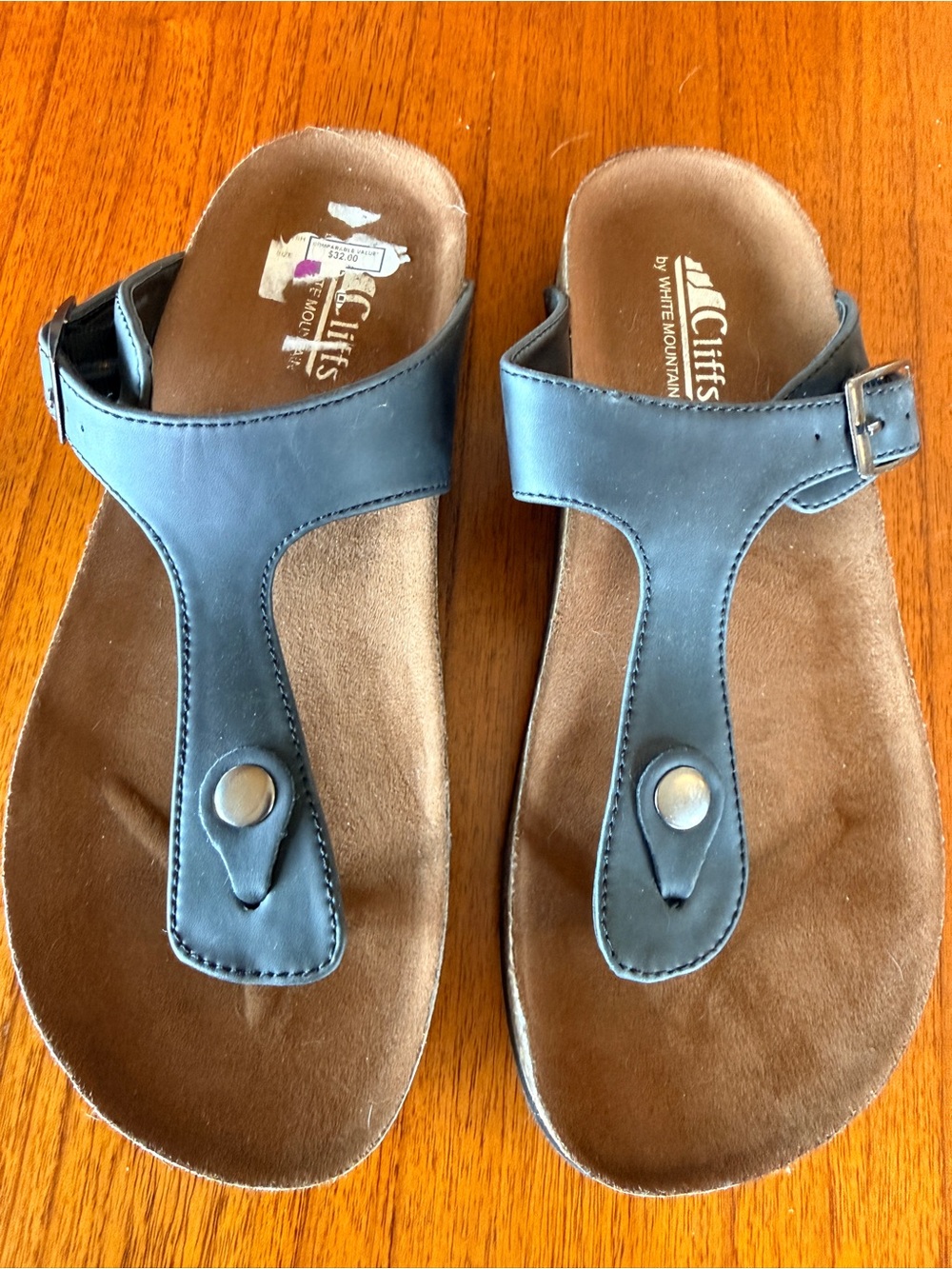 Cliffs by WHITE MOUNTAIN Black, Leather like,T-Strap Sandals with Brown Footbed